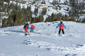 Kirkwood skiers in powder