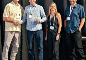 Left to right: Ski California President John Rice presenting Diamond Peak GM Mike Bandelin with the Dave McCoy Lifetime Achievement Award. Also pictured are Diamond Peak Patrol Director Kari Brandt and Mountain Operations Manager Jay Rydd.