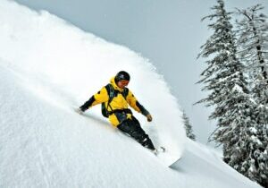 Thanks to this week's heavy snowfall, a Sugar Bowl snowboarder enjoys at powder day this week.